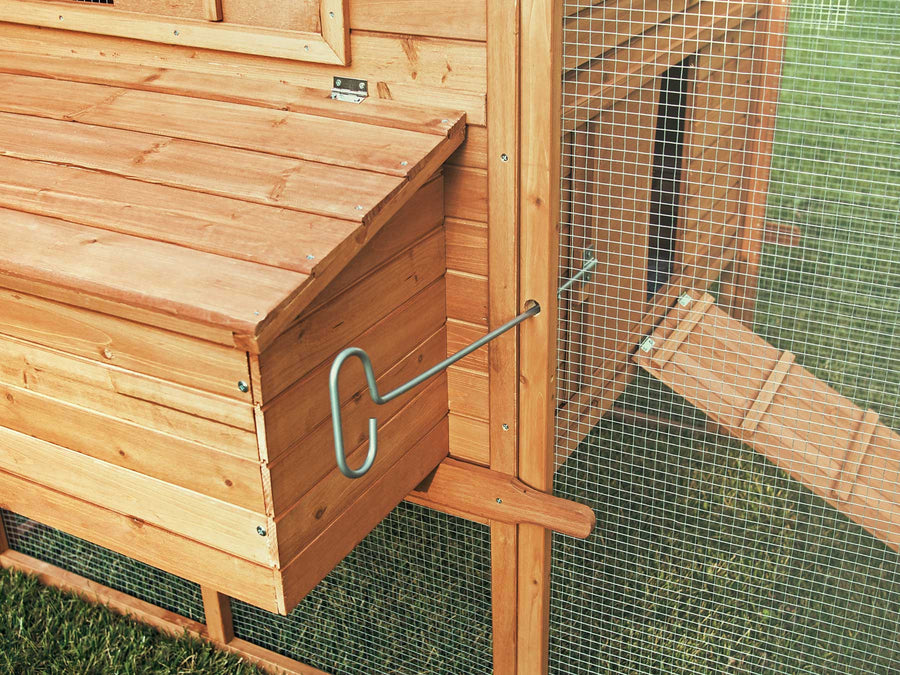 The Ranch chicken coop's pull rod makes it easy to open and close the run's access door